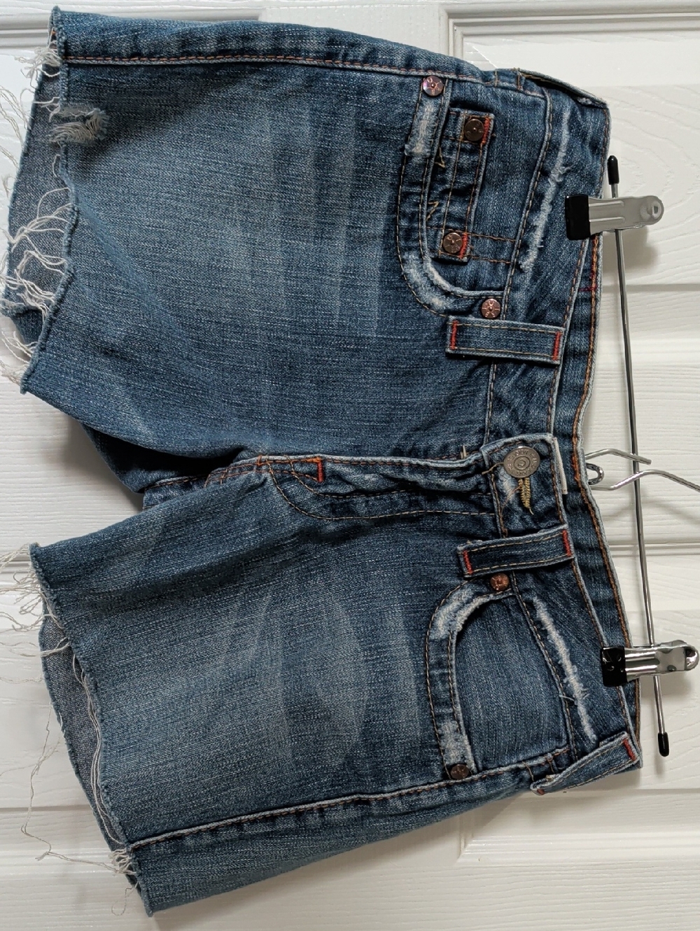 True Religion Distressed Medium Blue Denim Cutoff Shorts